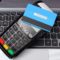 Payment terminal with contactless credit card and laptop